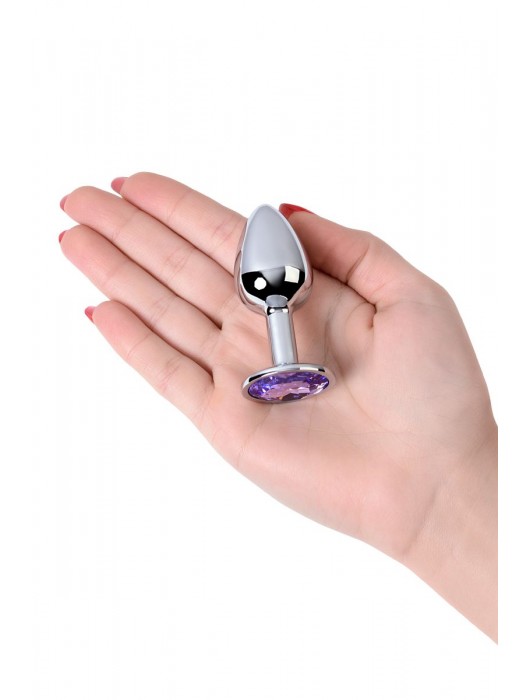 Серебристая конусовидная анальная пробка с фиолетовым кристаллом - 7 см. - ToyFa - купить с доставкой в Энгельсе